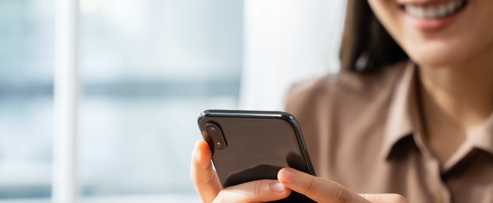 Person using a phone to call
