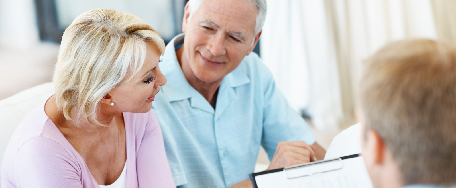 Man and Woman meeting with an advisor