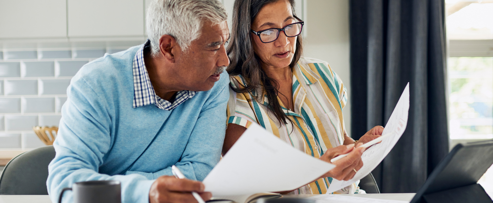 Man and Woman looking at documents