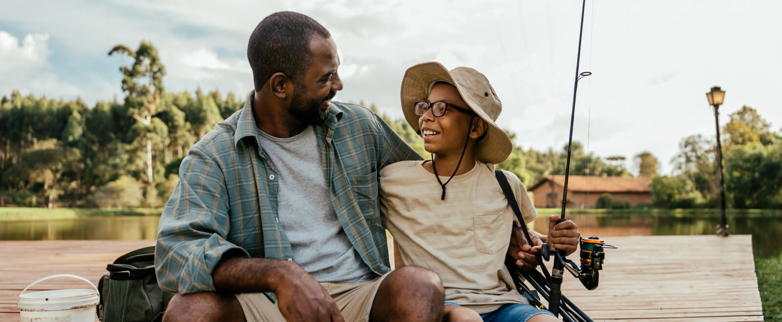 Dad and kid fishing