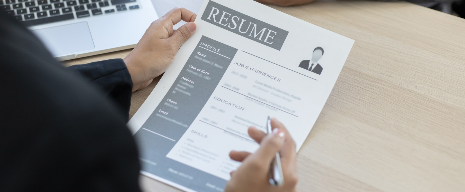 Person looking at a resume