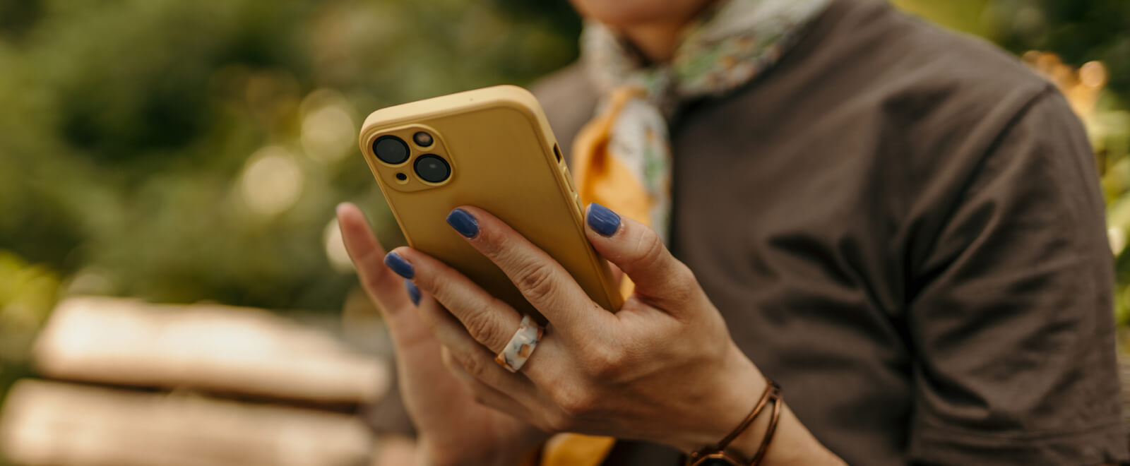 close-up of hands holding a smartphone